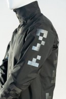 Retroreflective 2D barcode cycling jacket by Philip Siwek meant to keep cyclists safe from AVs
