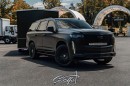 Matte black Cadillac Escalade with matching Forgiato wheels and custom trailer for Lil Uzi Vert