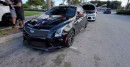 Cadillac ATS-V takes on a Chevrolet Camaro SS in a straight line
