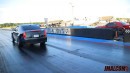 Cadillac CTS-V vs Dodge Challenger grudge drag race by Jmalcom2004
