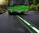 Conductive charging by in-road electric rail