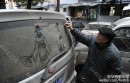 Chinese Retired Teacher Makes Finger-Painting Art on Dusty Windshields