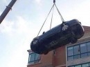 Chinese Woman Crane-Lifts Son-in-Law's Audi onto Roof