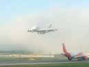 Emirates Airbus A380 emerging from the clouds
