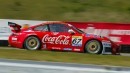 Porsche race cars in Coca Cola livery