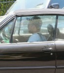Robert Pattinson drives a BMW E30