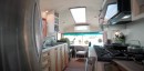 Couple downsizes their life and moves into a beautiful self-converted school bus