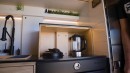 Cozy, Carpenter-Built Camper Van Boasts a Unique U-Shaped Kitchen and a Hidden Shower