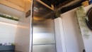 Cozy, Carpenter-Built Camper Van Boasts a Unique U-Shaped Kitchen and a Hidden Shower