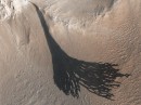 Dark streaks cause by Martian dust avalanches