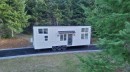 Custom home on wheels fits all the necessities into 325 sq ft of living space