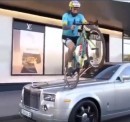 Bicyclist Jumps On Top of Rolls-Royce hood