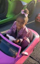 DaBaby's Daughter in a Mercedes Toy Car