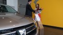 Diana Ileana Şerban, the 1.5 millionth Logan buyer and Jan Ptacek, Renault Commercial Roumanie General Manager