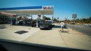 Buying a 2005 Porsche Carrera GT at gas station