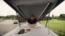 Deluxe Sprinter Camper Van Breaks the Norm With a Staircase Leading to a Cozy Pop-Top Roof