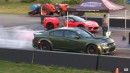 Corvette versus Mopar drag races on Wheels