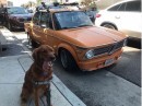 Scout with a 1971 BMW 2002