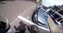 Distracted driver hits stopped motorcycle