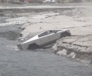 Tesla Cybertruck gets stuck in the river