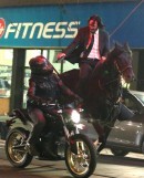 Keanu Reeves rides horse, chases down bad guy on bike on "John Wick 3: Parabellum" movie set