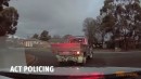 Aussy performs a burnout in front of a police vehicle