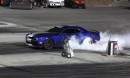 Dodge Challenger SRT Hellcat takes on a BMW S1000 RR motorcycle