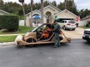 Smart modified to look like Fred Flintstone's footmobile, in Florida