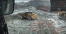 Dump truck drifting on mud