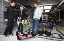 Vettel presents Ecclestone with the zimmer frame