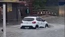 Renault Kwid crosses major flood in Florianopolis just by floating out of it