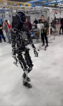 Tesla Optimus bot walks naked