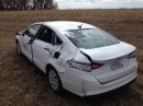 Ford Fusion sliced by a plane's propeller