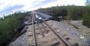Bike falls through railroad