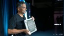 Ganesh Venkataramanan, Tesla’s senior director of Autopilot hardware and Project Dojo leader, shows the Dojo's training tile