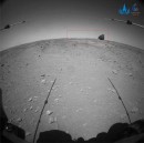 Taken by Zhurong's front obstacle avoidance camera, the image shows the rover approaching its parachute and backshell assembly