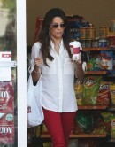 Eva Longoria Stops at Gas Station With Her Tesla Model S