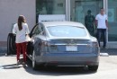 Eva Longoria Stops at Gas Station With Her Tesla Model S