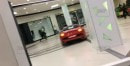 Ferrari California drifts and does donuts in shopping mall