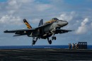 F/A-18E Super Hornet coming in for arrested landing on USS Abraham Lincoln
