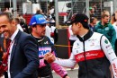 Fernando Alonso and Zhou at British GP