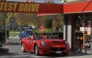 A rented Ferrari California leaves Push to Start headquarters