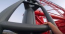 George King scales and BASE-jumps off Red Force, the Ferrari rollercoaster in Spain