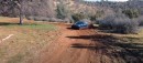 Tesla Model 3 in the dirt