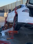 Firefighters needed 6,000 gallons of water to put out a “spontaneous” Tesla battery fire