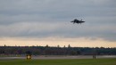 A U.S. Air Force F-35A Lightning II lowers landing gear upon arrival at RAF Lakenheath