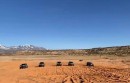 Five 2021 Ford Bronco SUVs demonstrating Trail Turn Assist feature in Moab