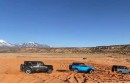 Five 2021 Ford Bronco SUVs demonstrating Trail Turn Assist feature in Moab