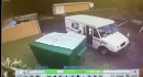 U.S. Postal worker throws mail in the trash