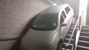 Driver takes the stairs trying to exit the stadium car park
